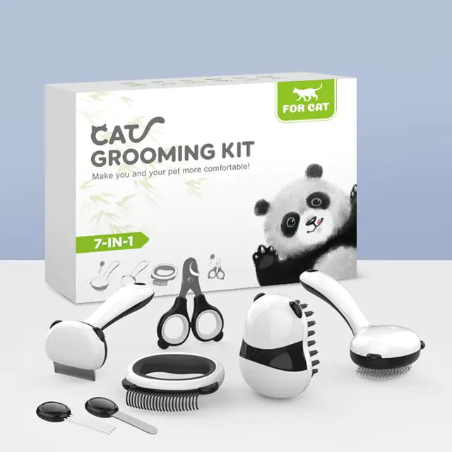 Pampered Pet Grooming Kit package displayed with contents in the foreground, white and blue backdrop.