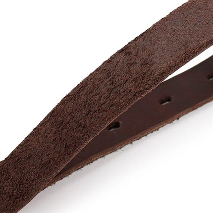 close up of both sides of a brown leather collar, white background. 