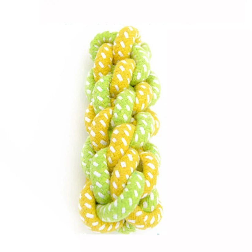 green and yellow rope toy on a white background 