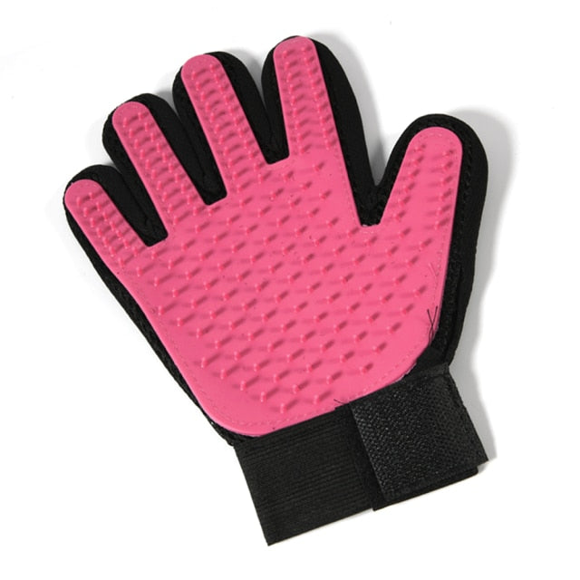 palm view of pink grooming glove, white background.