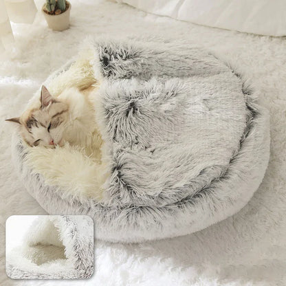 kitten sleeps in a grey snuggle beds in a home setting, insert image shows close up shot of the soft lining. 