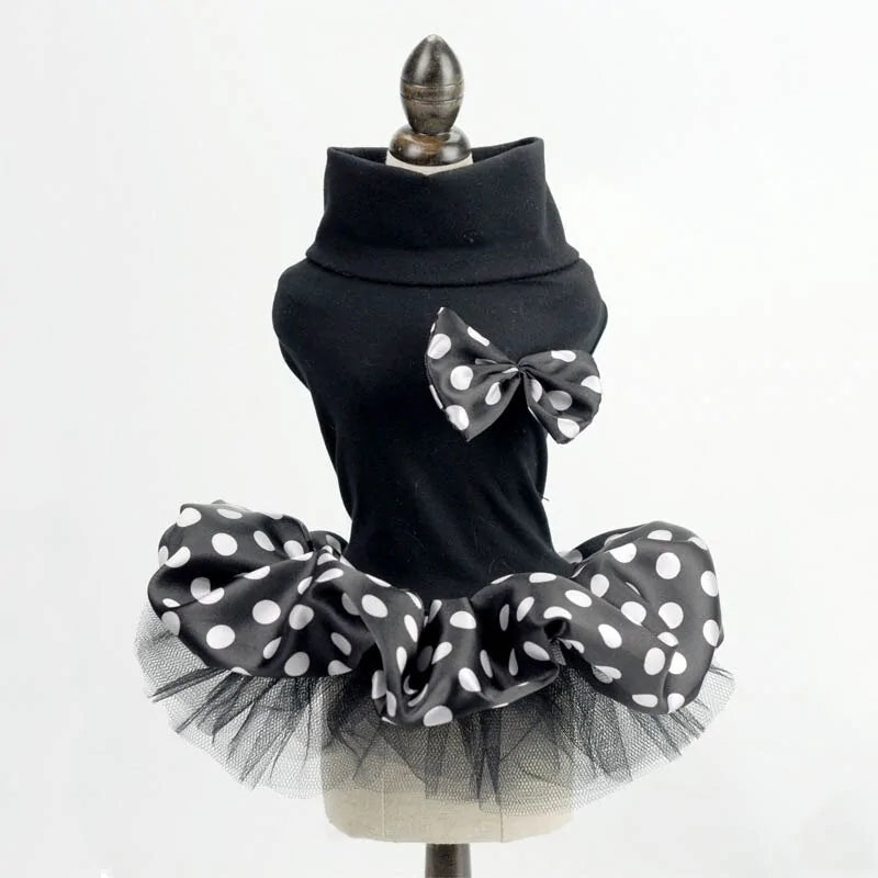 Black poker dot Glamour Princess Party Dress on a stand, white background 