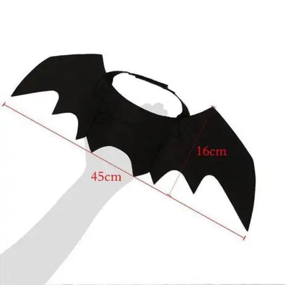 bat wing costume on white background, showing dimensions, 45 x 16 cms 