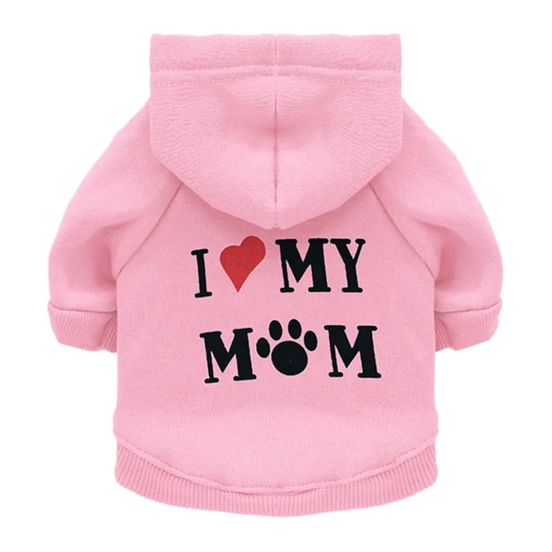 Pink 'I love my Mom' Stylish Pet Hoodie on a white background. The word Love is depicted by a red heart and the 'o' in the word mom is depicted with a pawprint. 