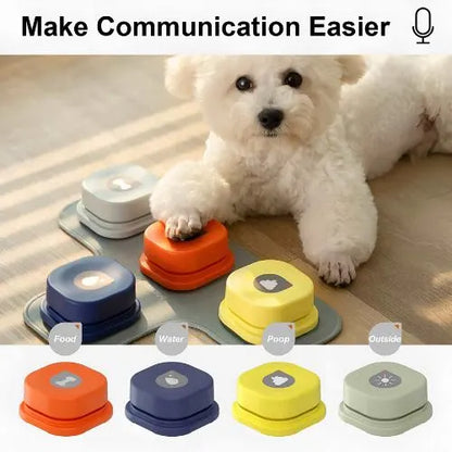 cute white dog touches a red Speak & Play Dog Communicator button with it's paw, in a home setting. inset at bottom of images shows the four colors and suggested commands to record.  