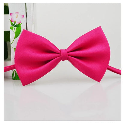 Pink bow tie on a white background 