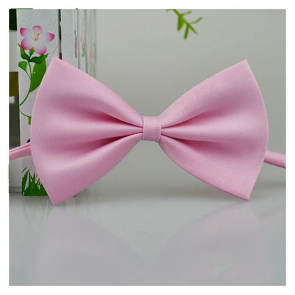 pale pink bow tie on a white background 