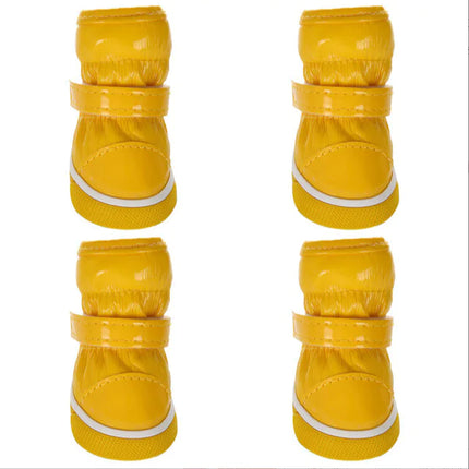 yellow deluxe pet boots on white background