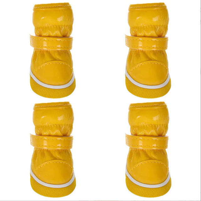 yellow deluxe pet boots on white background