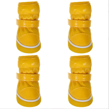 yellow deluxe pet boots on white background