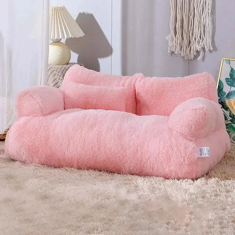 Pink luxe pet sofa in a home setting