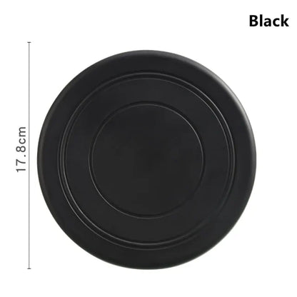 A black Soft Non-Slip Flying Disc on a white background. Dimensions are shown 17.8 cm diameter. 