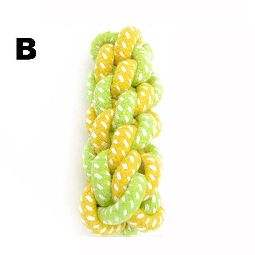 Green and yellow rope toy on a white background 