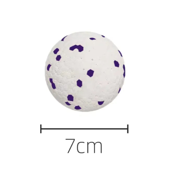 white ball toy on white background showing dimensions of 7 cm diameter