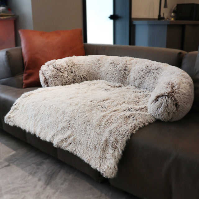 Coffee color sofa bed on a brown couch in a home setting