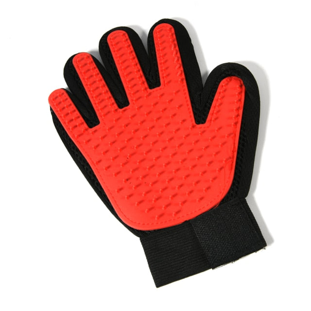 palm view of red grooming glove, white background.