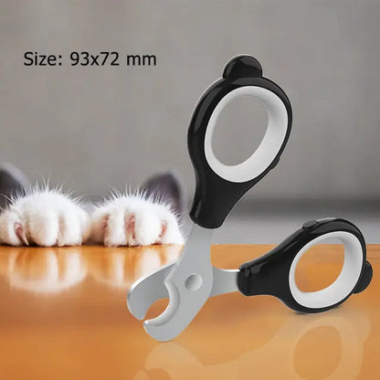 Nail Clippers and dimensions displayed , a pair of cat's paws are in the background. 