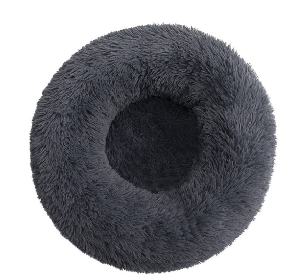 dark grey donut bed on white background. 