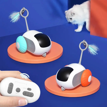 Blue and Orange Interactive Remote-Controlled Cat Toys on a blue background, the remote control is in the foreground of the image and a white Persian cat is in the background 