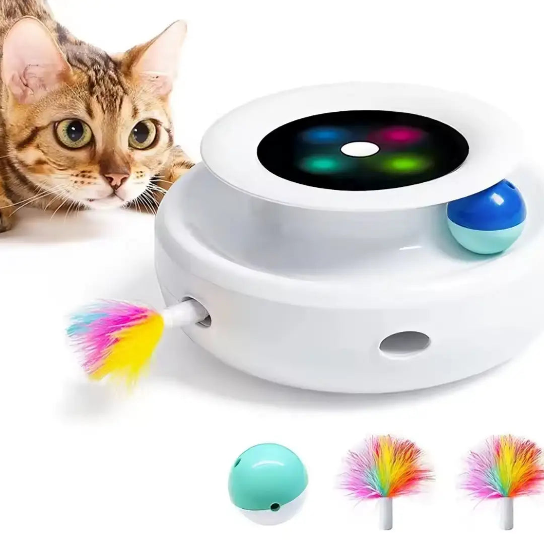 tabby cat staring at the Feather Frenzy Cat Toy on a white background. The toy shows feather, ball and light features. 
