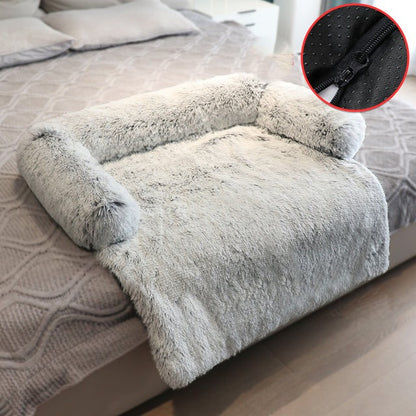 Light grey sofa bed in a bedroom setting, the sofa bed is positioned at the base of the bed, a smaller inset image shows the zipper, for easy cleaning. 