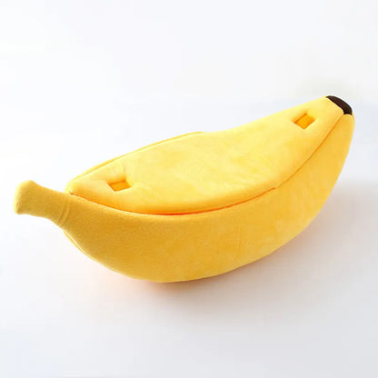 Yellow Banana Shaped Pet Bed on white background