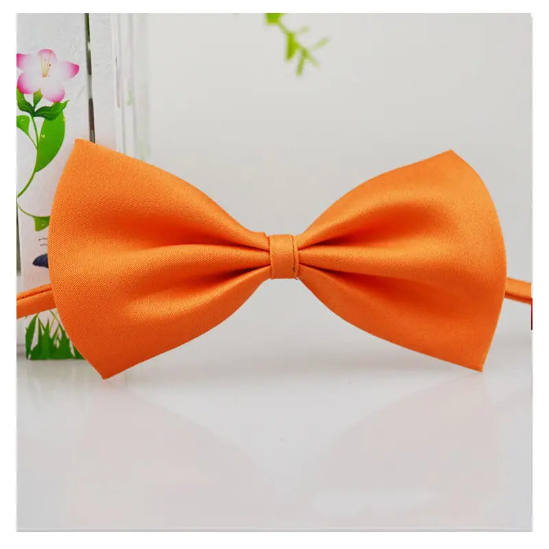 orange bow tie on a white background 