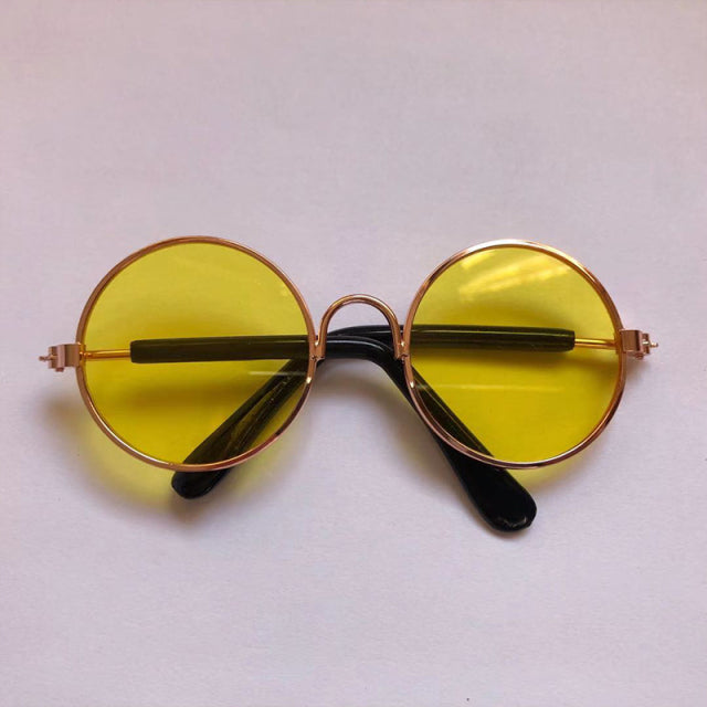 yellow sunglasses on white background