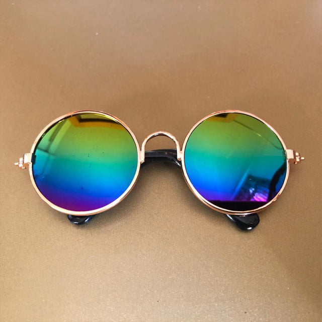 rainbow lens sunglasses on beige background