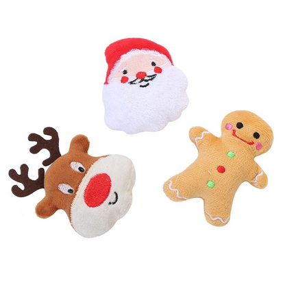 three plush cat toys on white background. a reindeer, Santa Claus and a ginger bread man. 