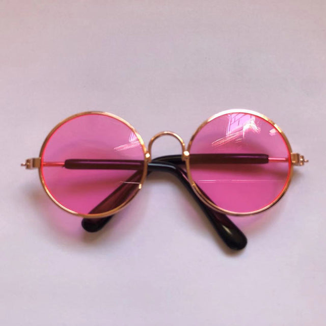 pink sunglasses on white background