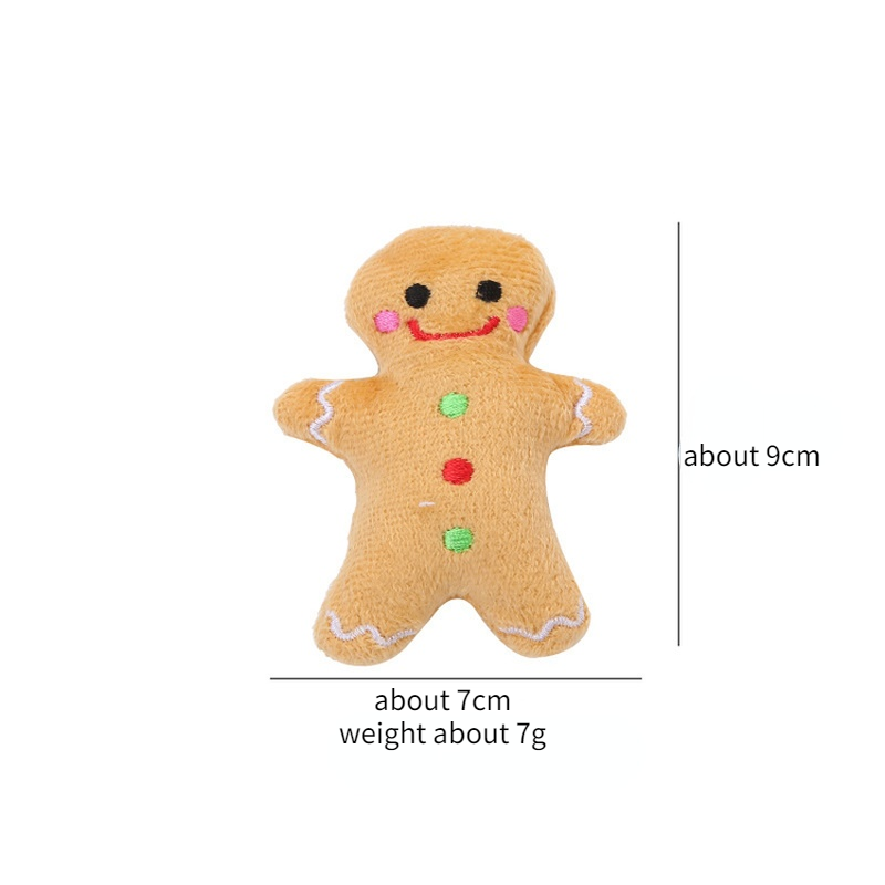 Gingerbread man plush toy on white background displaying size dimensions. 