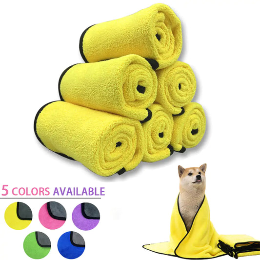 main image a stack of six yellow towels on a white background. Bottom right is a light colored dog wrapped in a yellow towel. Five insets showing colors available - yellow, pink, purple, green and blue. 