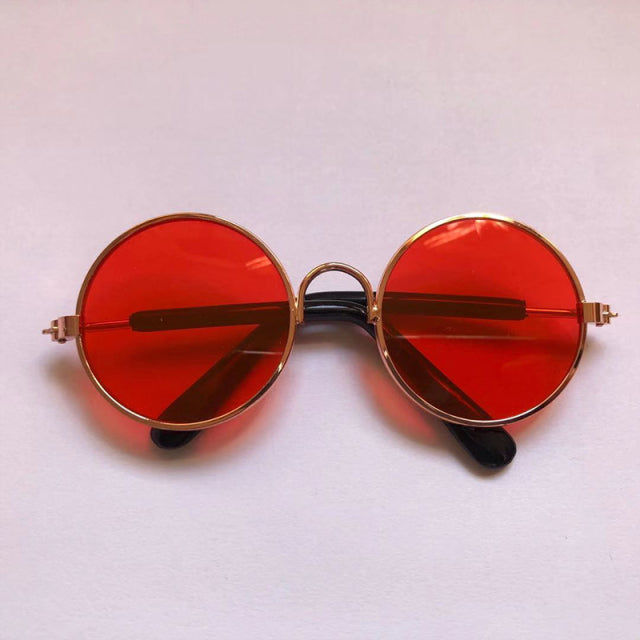 red sunglasses on white background