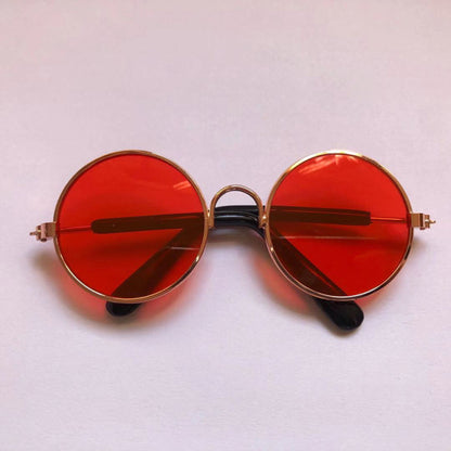 red sunglasses on white background