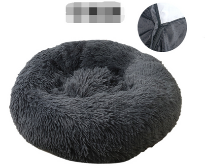 white background, dark grey donut bed, inset shows close up of zip, to take the cover off. 