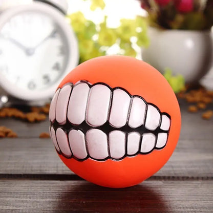 orange smile ball in a lifestyle shot on a wooden surface. 