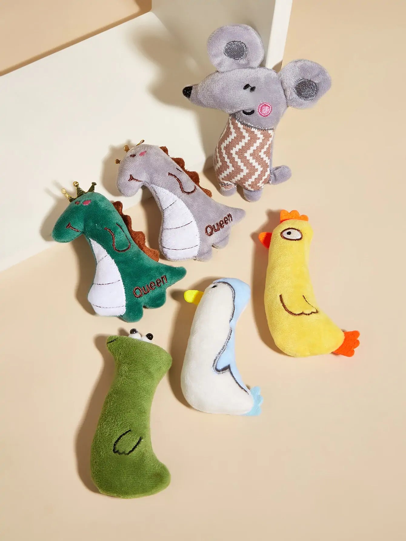 selection of six different plush toys