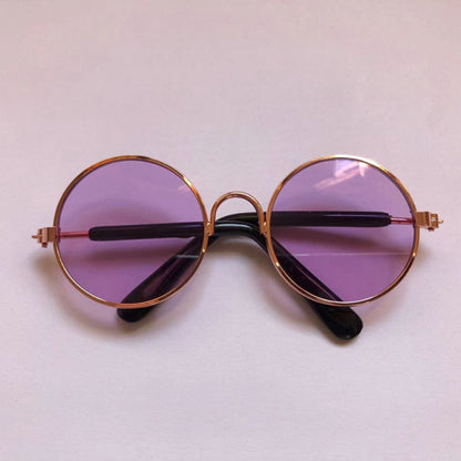 purple sunglasses on white background