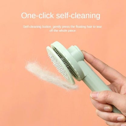 apricot background, close up image of mint green brush in use, releasing pet hair from bristles. 