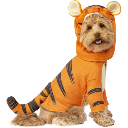 fluffy brown dog wearing tiger costume, hood on, white background. 