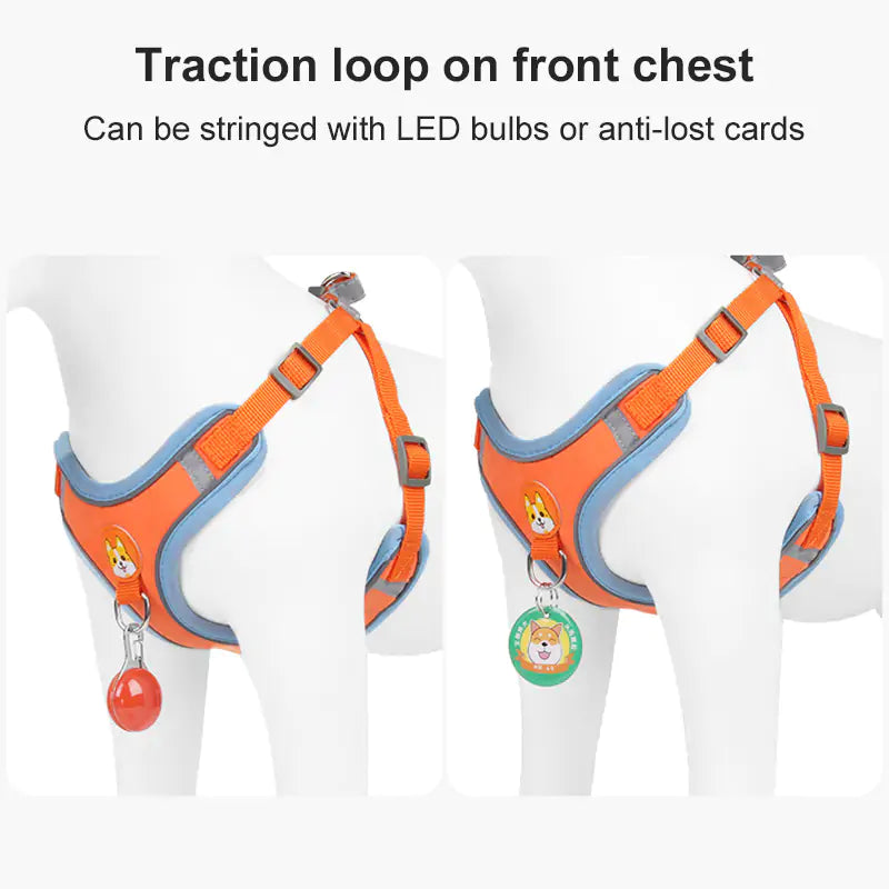 image shows a white mannequin dog, wearing an orange harness, with focus on the loop to attach a LED bulb or anti-lost card to the front of the harness. white background. 